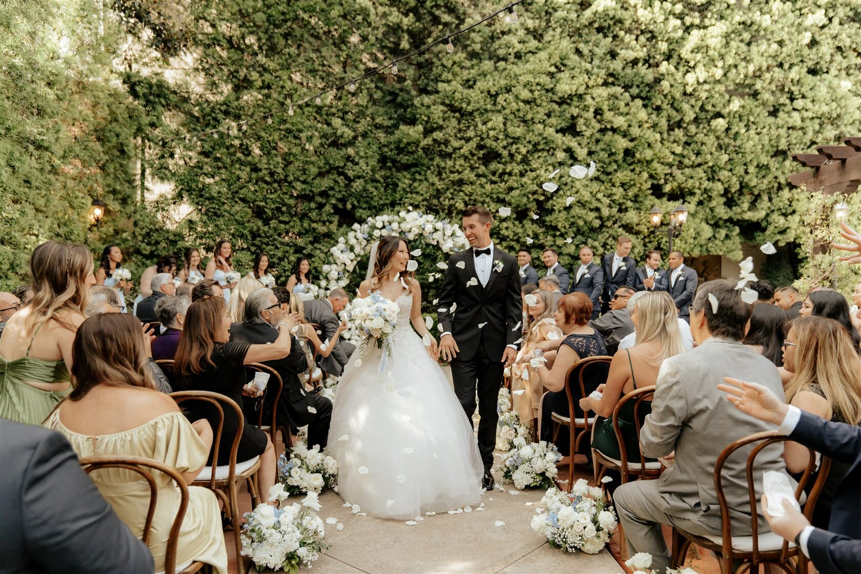 Outdoor wedding ceremony floral design