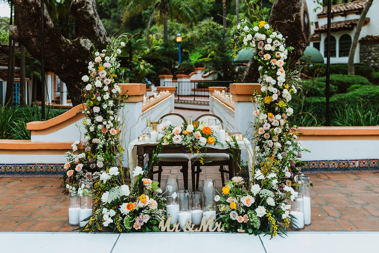 Sweetheart table floral installation